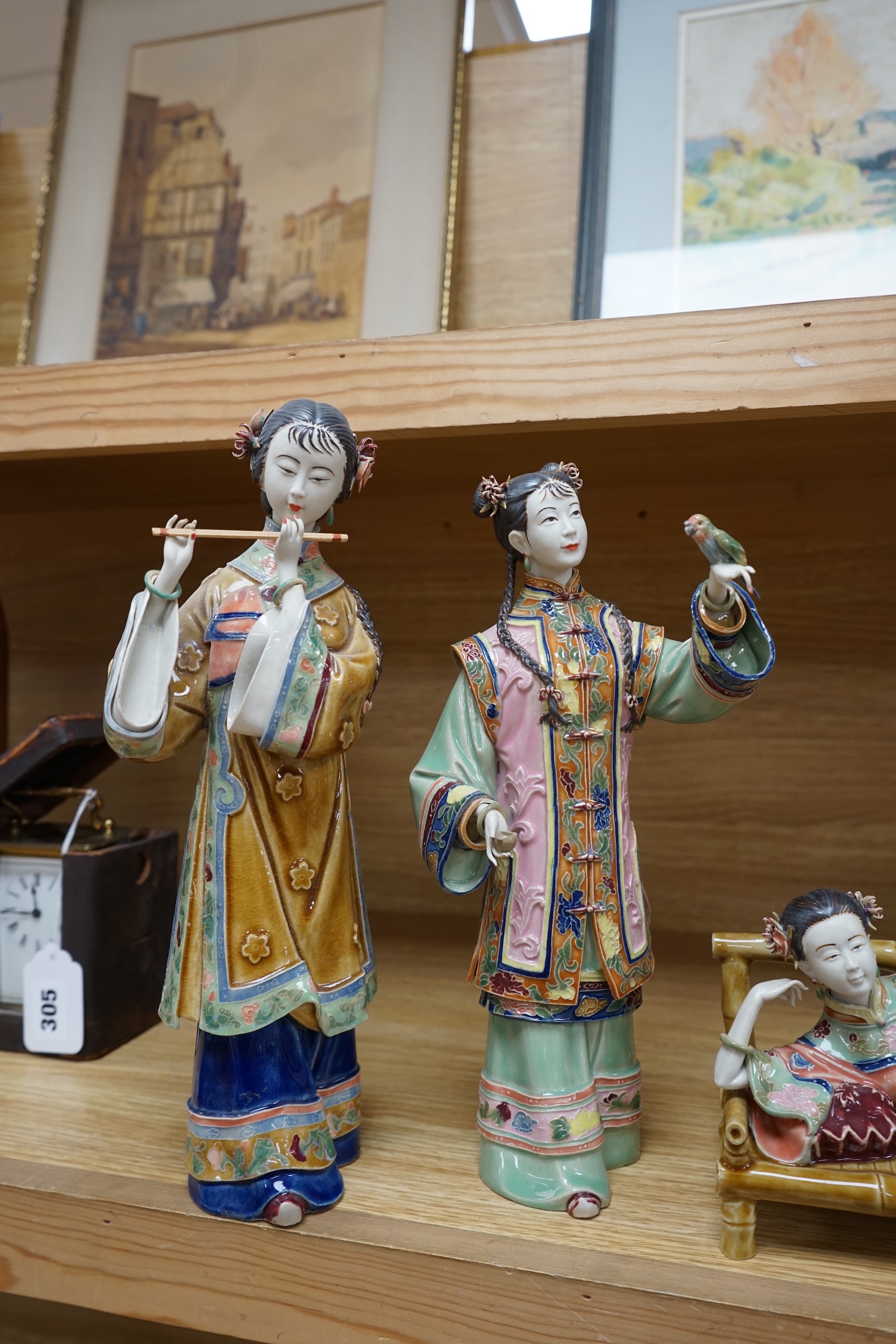 Four Chinese porcelain figures of ladies, tallest 31.5cm. Condition - good.